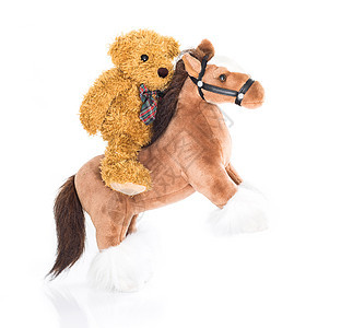 泰迪熊骑马国家娃娃牛仔卡通片牧马人童年吉祥物骑术农民玩具熊背景图片