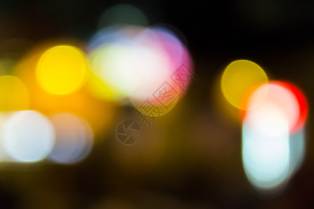 具有散景效果的模糊灯光的抽象背景情绪庆典假期圆圈火花愁云来源紫色派对城市图片
