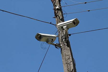 挂在房子入口处的闭路电视摄像头监视器控制妄想症环形技术安全守护警察监控间谍图片