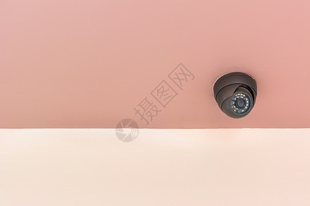 室内混凝土墙上的现代安保摄像头安全监视器间谍危险监视控制预防隐私警卫镜片图片