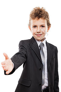 手打招呼或碰面握手时 穿着商业西装的笑男孩图片