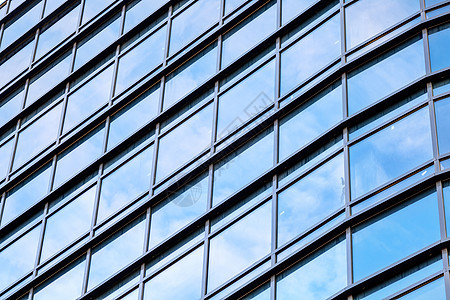 玻璃面罩天空城市市中心反射摩天大楼技术镜子办公室蓝色建筑图片