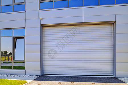 工业建筑上的铝立面公司建造货物玻璃盘子控制板工厂建筑学仓库窗户背景图片