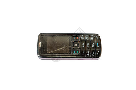 旧的破旧移动电话孤立白底背景展示按钮手机键盘灰尘机动性数字裂缝商业互联网图片