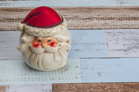 圣诞节和新年的装饰季节喜悦礼物玩具帽子假期制品胡须塑像木头图片