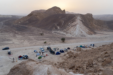 以色列的荒野露营地假期远足帐篷旅行旅游日落生态游客沙漠地球图片