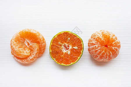橙片孤立在白色背景上的新鲜橙果汁柠檬植物排毒皮肤叶子水果热带听筒甜点背景