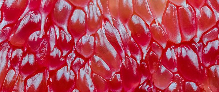 红柚纸浆纹理背景的宏观拍摄 泰国暹罗红宝石柚子 维生素 C 抗氧化剂和钾的天然来源 减缓衰老的健康食品老化热带红宝石素食主义者药图片