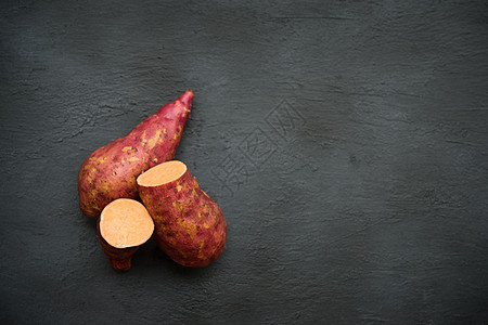 新鲜橙红甜土豆皮肤烹饪生产番薯木头杂货店块茎食物团体饮食图片