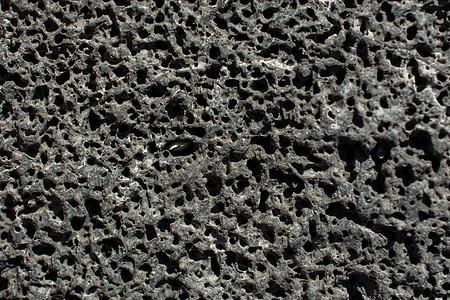 作为背景纹理的岩石或石头表面土壤沉积编队花岗岩地质学摇滚建造墙纸地面灰色图片