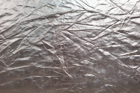 抽象纹理 皱巴巴的银色金属光泽织物背景收获销售量大厅包装纸假期浅色水平创造力乐趣辐射图片