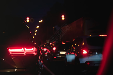 车 路车尾灯在黄昏的路上闪亮运输背景旅行时间车辆街道场景驾驶城市安全背景