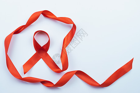 AIDS意识 白色背景的红丝带和复制空间f治愈帮助癌症生活世界女士保健机构预防幸存者图片