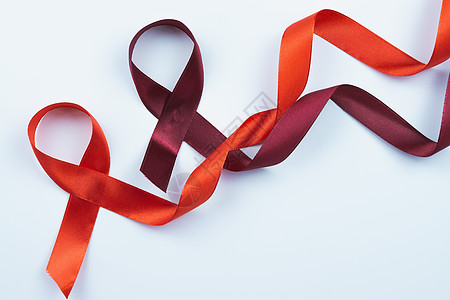 AIDS意识 白色背景的红丝带和复制空间f机构帮助疾病治疗治愈卫生世界女性幸存者活动图片