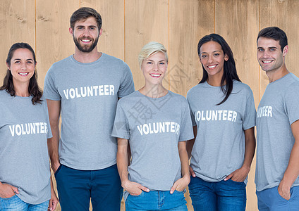 一群在微笑的志愿者团体击剑朋友志愿栅栏帮助福利机构快乐图形团队图片