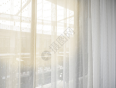 晨光透过白色窗帘的都市卧室 给人一种幸福清新温馨的感觉图片