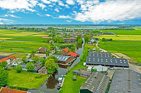 绿色城市从荷兰农村Zevenhuizen村起飞的空中飞机 来自荷兰草地鸟类景观住宅住房绿色地平线眼睛建筑照片背景