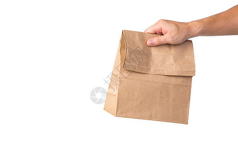 男人拿着棕色纸袋白色生态送货产品早餐店铺食物市场销售回收背景图片