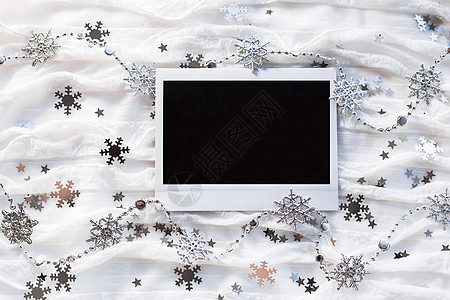 冬季背景 装饰雪花和相片 您的照片或文字的空照片框假期白色织物风格边界记忆新年框架图片