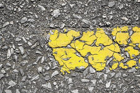 道路纹理上黄线的特写路面沥青灰色运输条纹街道柏油交通车道黑色图片