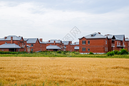 两层房屋的平原村 低层发展街道乡村住宅领土建筑木头房子小屋农场蔬菜图片