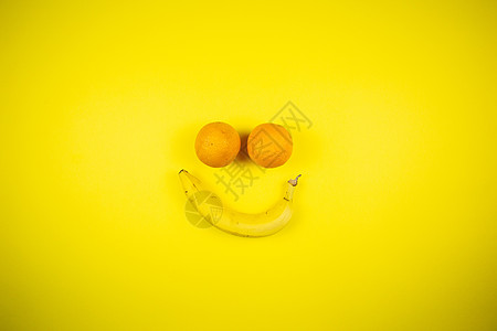 微笑的香蕉和橘子符号水果表情卡通片金子笑脸白色情感漫画乐趣图片