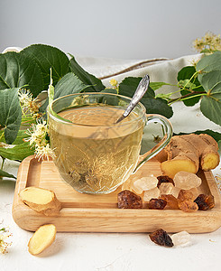 杯中含姜汁的茶 和银枣的茶药品早餐植物措施玻璃芳香补救食物桌子杯子图片