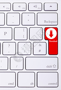 键盘上带有下载符号和文字的键盘键背景图片