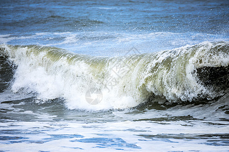 溅起的水花风雨如磐的海洋风景背景泡沫风暴海浪天空海岸海滩蓝色沿海飞溅休息背景