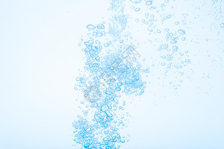 蓝色水中白色背景的泡泡Name运动宏观水滴波纹液体海浪图片