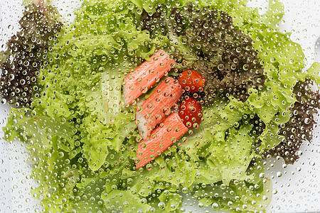 蔬菜背景的水滴图片