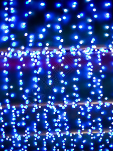 芭堤雅派对夜市模糊光的蓝色水落假期街道背景纪念日城市瀑布派对墙纸购物灯泡图片