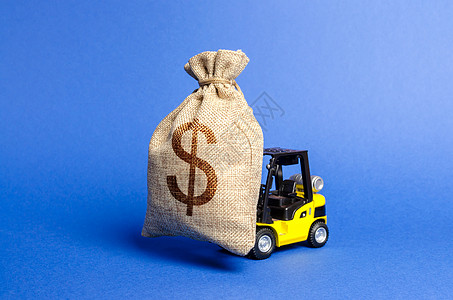 黄色叉车运载一大袋钱 吸引投资于生产和经营项目的发展和现代化 收入 利润 销售额 超级利润 复制空间图片