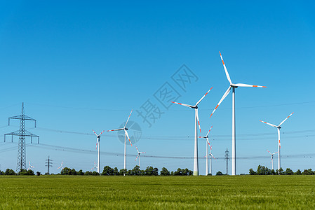 高管电线和风力发电厂能源发电机涡轮机涡轮电缆发动机电力线转换器环境风车图片