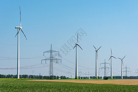 高管电线和风力涡轮机发动机植物天空接线活力发电机资源力量发电厂能源图片