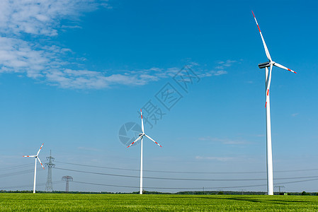 高管电线和风力涡轮机发电机引擎电力线转换器风车能源涡轮风能传播天空图片