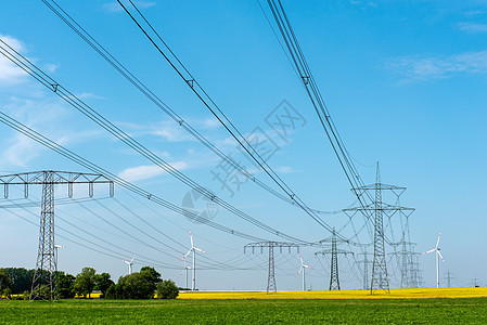 电线和风力涡轮机接线资源能源发动机风能力量天空环境过渡电力线图片