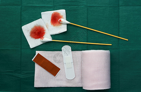 包括石膏 胶布 卷毛巾和绿色的血纱布等工具诊断敷料援助技术商业情况手术病人伤口保健图片