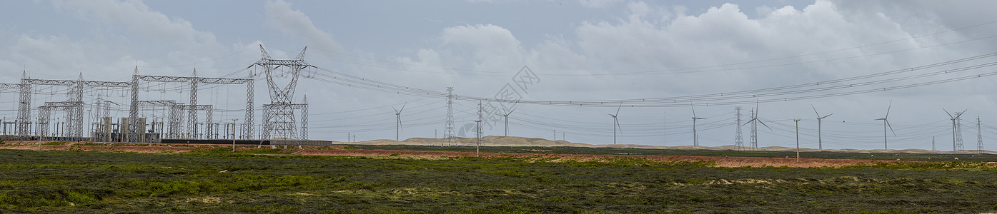 巴西阿廷斯附近田地上的风车和电塔商业力量海滩干旱风力能源能量源活力环境沙漠背景图片