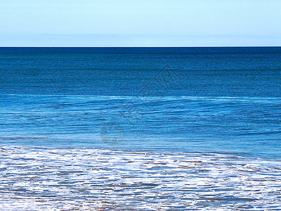 在阿尔布费拉有波浪的深海蓝海福利海浪海岸海滩太阳地平线天空图片
