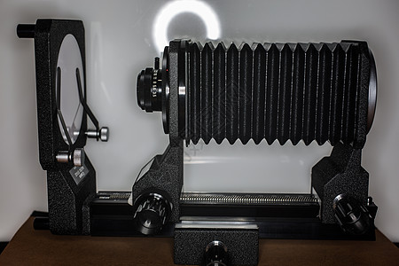 带透镜的黑贝喉设备对象波纹管折射光学瀑布技术条件反射镜片摄影图片