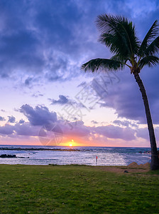 夏威夷Kauai海岸的日落风景太阳旅游热带海洋日出天空旅行天堂波浪图片