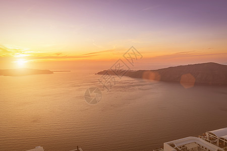 伊梅村的日落俯视卡代拉和海面全景岩石火山天堂旅行太阳夕阳奢华射线天空图片