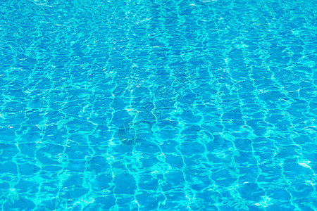 水蓝色在便便中游泳假期海浪热带墙纸波纹太阳水池液体海洋阳光图片