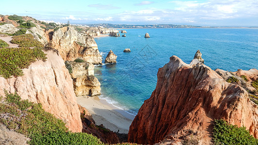 葡萄牙阿尔加夫海悬崖的全景 天空充满云彩蓝天海洋太阳日历边缘日出海岸线孤独洞穴天堂阳光图片
