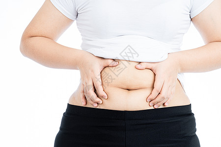 胖女人拿着过多的脂肪腹部 超重的脂肪腹部在白色背景下被隔离 饮食生活方式 减肥 胃肌 健康理念损失腰部展示肥胖烧伤橘皮女士检查身图片