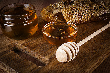 蜂蜜和蜂窝药品勺子六边形蜂蜜液体蜂蜡细胞营养荒野橙子图片