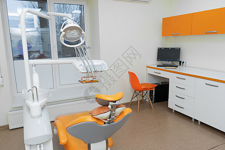 内务现代牙医办公室以橙色风格时尚诊所外科医生卫生牙齿牙科椅子工具矫正职场背景图片