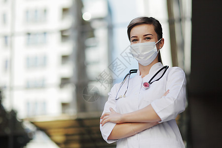 家庭医生戴面罩保护面具的女医生或护士Covid19保健概念诊所专家安全医师感染卫生女士女性药品预防背景