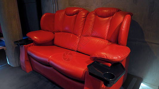红色皮革电影院影院座椅椅子投影仪展示观众投影大厅地面音乐时间娱乐图片